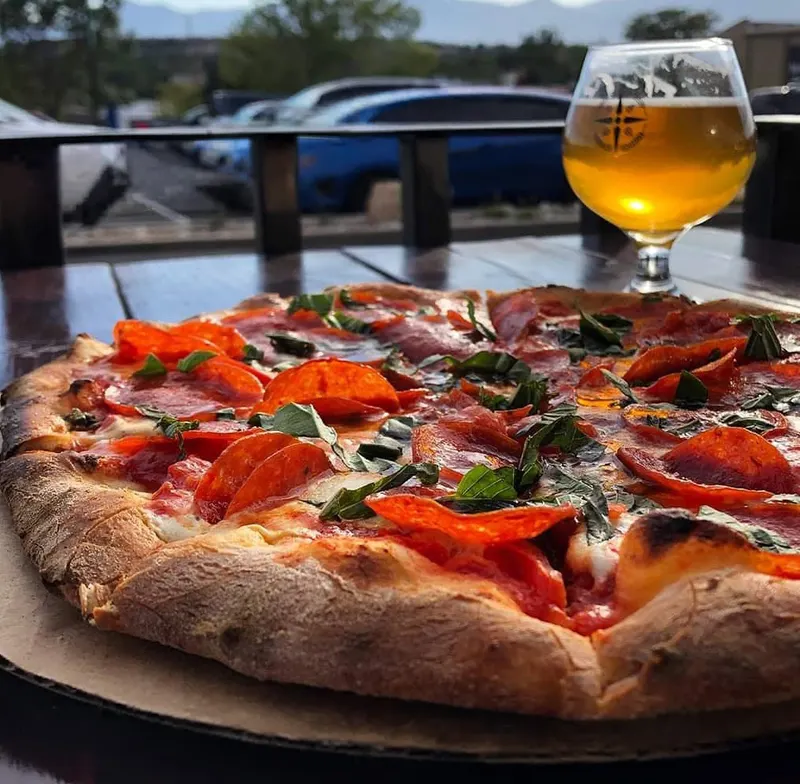 Witty Pork’s Woodfired Pizza official food or truck photograph